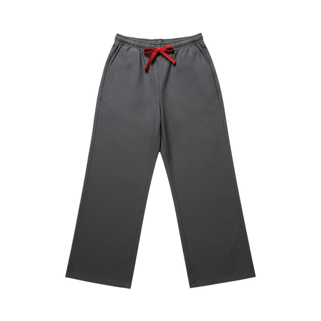 Calças largas cinzentas de ganga Tralulu com cós elástico e cordão vermelho, corte amplo.