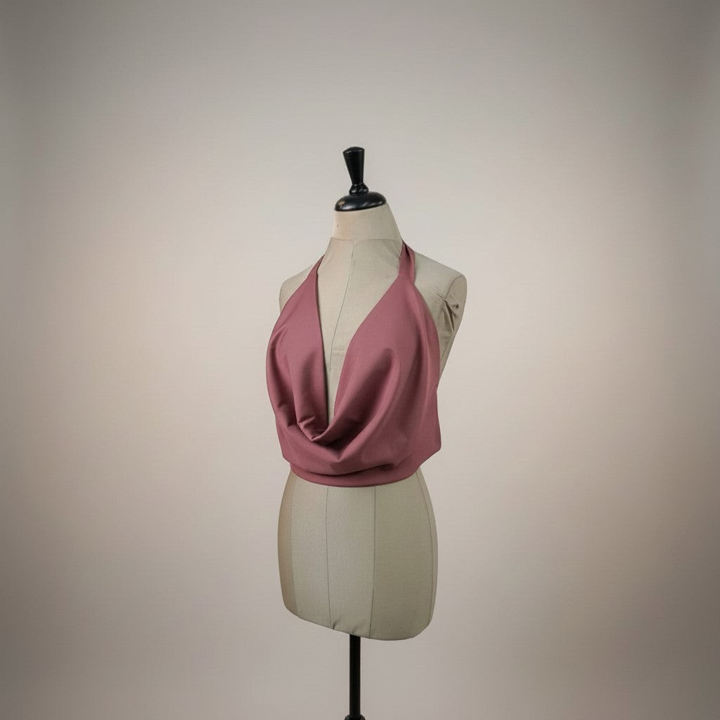 Top rosa pálido Tralulu com decote halter e drapeado elegante em malha.